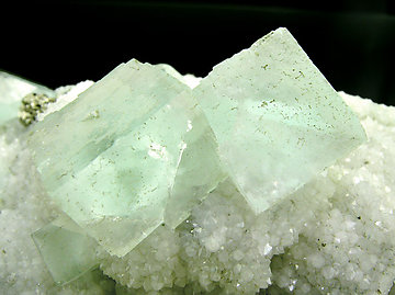 Fluorite with Quartz, Pyrite and Calcite. 