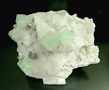 Fluorite with Quartz, Pyrite and Calcite.