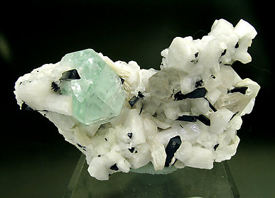 Fluorite with Schorl, Quartz, Muscovite and Feldspar.