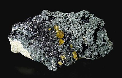 Andradite (variety topazolite) with Clinochlore. 