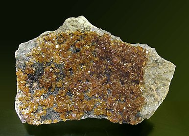 Andradite (variety topazolite) with Clinochlore. 