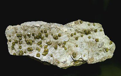 Andradite (variety topazolite). 