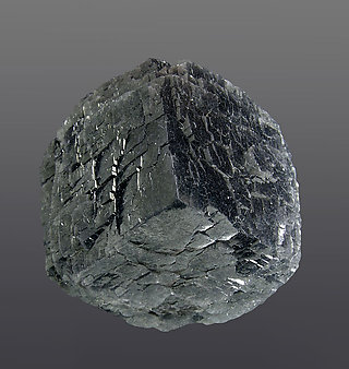 Calcite with Boulangerite inclusions.