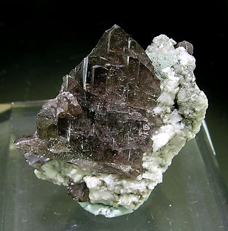 Axinite-(Fe)  with Albite.