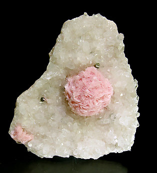 Rhodochrosite on Quartz.