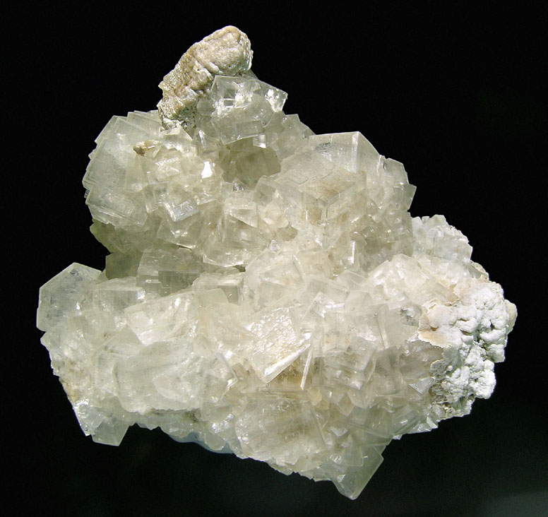 Кальцит порода. Карбонаты минералы. Карбонаты в природе. Карбонат камень. Кальцит необработанный прозрачный.