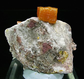 Wulfenite with Calcite. Rear