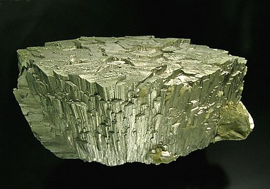 Arsenopyrite with Siderite and Muscovite.