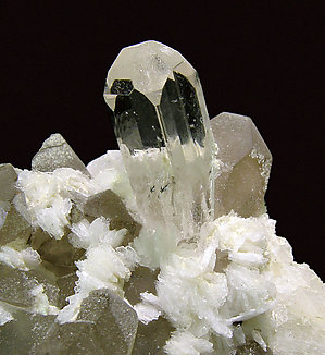 Topaz with Albite, smoky Quartz and Muscovite. 