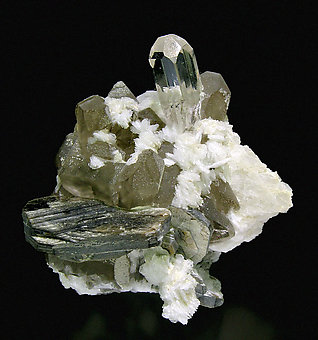 Topaz with Albite, smoky Quartz and Muscovite.