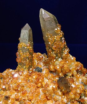 Spessartine with smoky Quartz. 