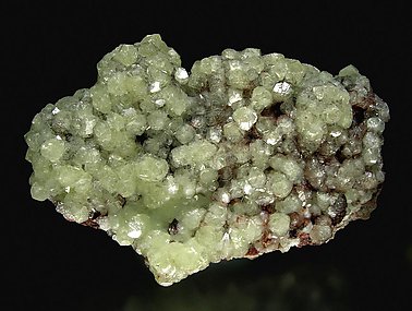 Smithsonite with Cuprite inclusions.