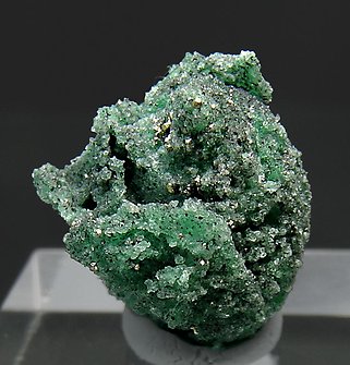 Beryl (variety emerald) replacing fossil.