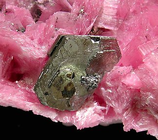 Rhodonite with Calcite, Pyrrhotite and Pyrite. 