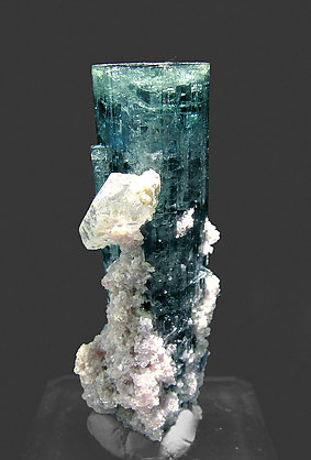 Elbaite (variety indicolite) with 'lepidolite' and Quartz. Rear