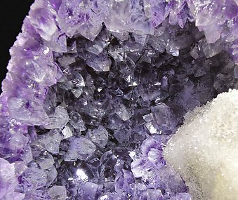 Calcite with Quartz (variety amethyst). 