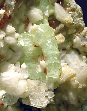 Fluorite with Pericline, Spessartine and Mica. 