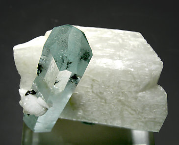 Beryl (variety aquamarine) with feldspar and Schorl. Top