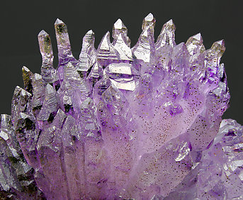 Quartz (variety amethyst) with Hematite inclusions. 