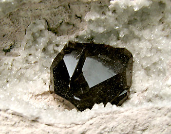 Almandine with Quartz. 