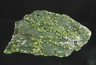 Andradite (variety demantoid). 