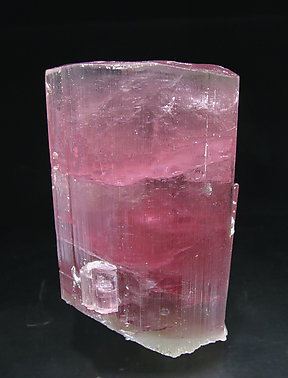 Elbaite (variety rubellite) with Feldspar.