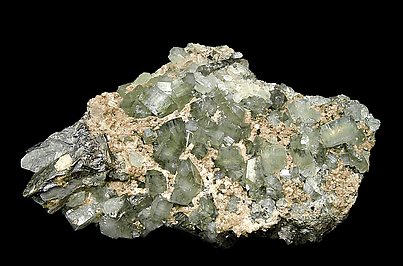 Fluorapatite with Siderite and Muscovite.