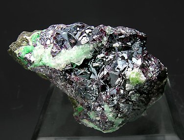 Cuprite with Calcite and Malachite.