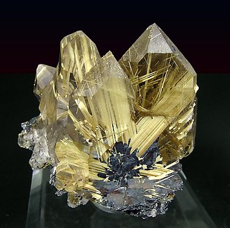 Quartz with Rutile and Hematite.