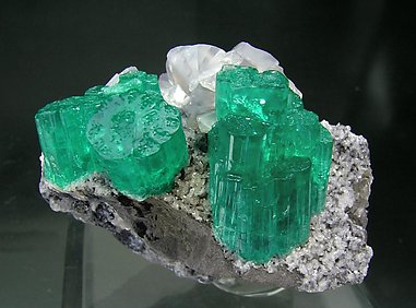 Beryl (variety emerald) with Calcite.