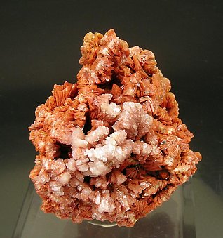 Baryte with Realgar inclusions.