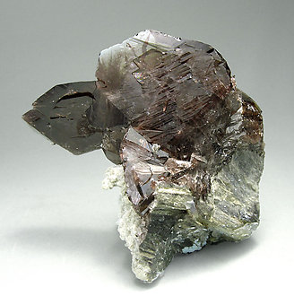 Axinite-(Fe) with Calcite. Rear