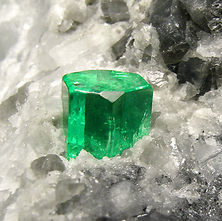 Beryl (variety emerald) with Calcite. 