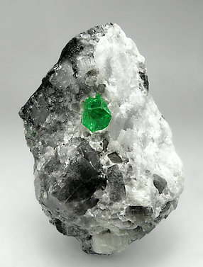 Beryl (variety emerald) with Calcite. Front