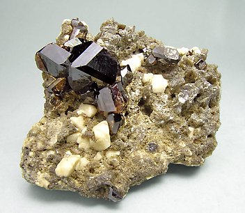 Cassiterite with Mica and Feldspar. 