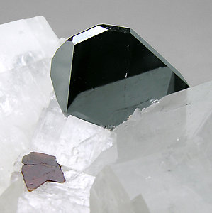 Hematite with Fluor-uvite and Magnesite. 