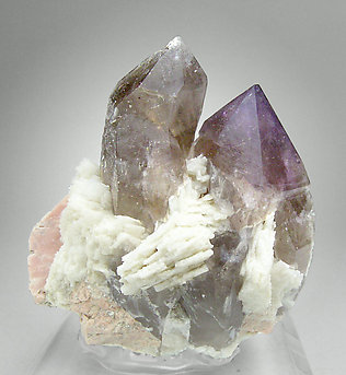 Quartz (variety amethyst) with smoky Quartz, Albite and Microcline. Rear