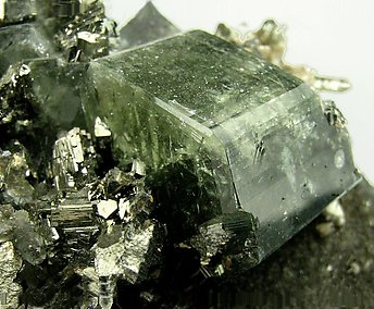 Fluorapatite with Arsenopyrite and Schorl-Dravite. 