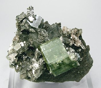 Fluorapatite with Arsenopyrite and Schorl-Dravite.