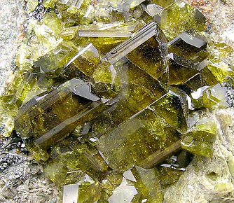 Epidote with Grossular (Hessonite). 