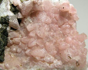 Rhodochrosite with Kentrolite. 