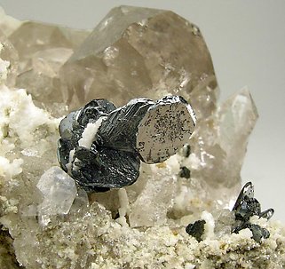 Hematite with smoky Quartz. 