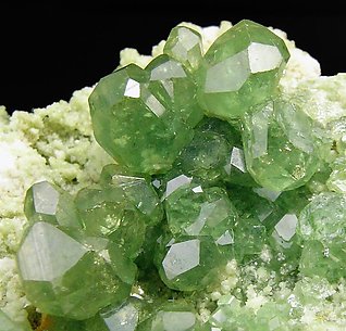 Andradite (variety demantoid). 