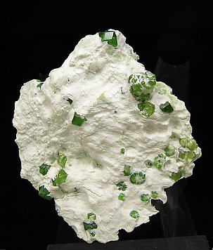 Andradite (variety demantoid) with Amphibole.