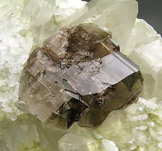Axinite-(Fe) with Quartz. 