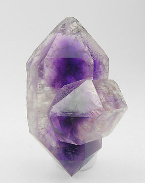 Quartz (variety amethyst) 'hour glass'. 