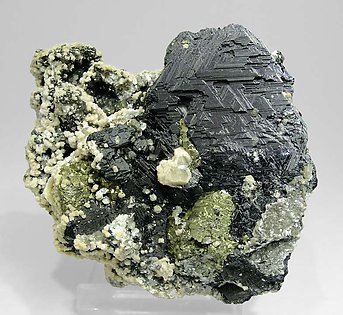 Sphalerite with Chalcopyrite, Siderite, Muscovite and Calcite.