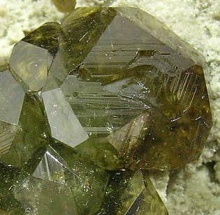 Andradite (variety topazolite). 