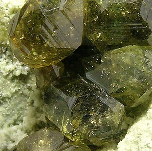 Andradite (variety topazolite). 