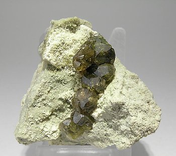 Andradite (variety topazolite). 